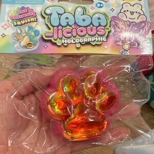 Viral Holographic Paw Taba Squishy Toy - Pink/Orange